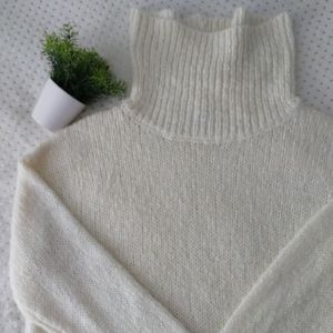 Cream turtleneck sweater